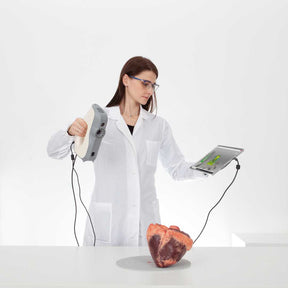 Woman in labcoat using Artec Eva handheld 3D Scanner